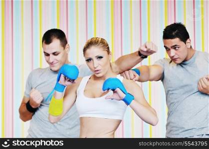 young adults in group have fitness training and representing teamwork concept