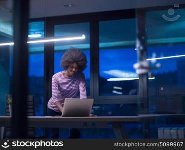 Young african american female Entrepreneur Freelancer Working Using A Laptop In Coworking space