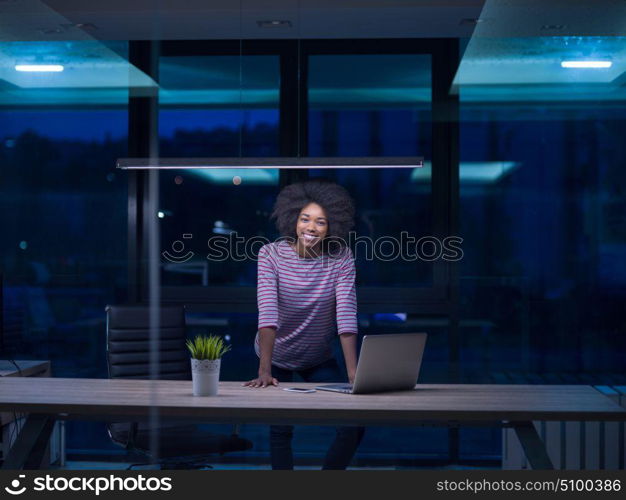 Young african american female Entrepreneur Freelancer Working Using A Laptop In Coworking space