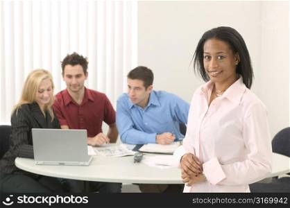 Young African American Female Executive Leading A Business Meeting