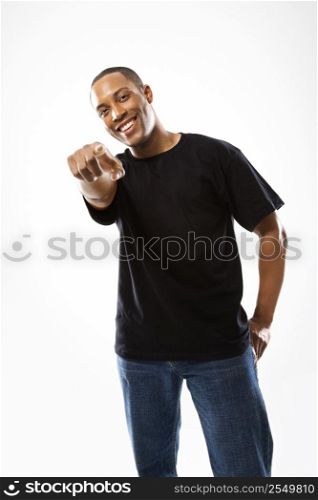 Young African-American male pointing at the viewer.