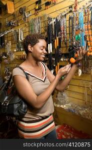 Young African American Woman Shopping For Jewelry