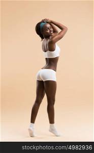 Young african athletic girl posing