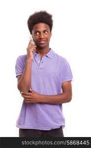 Young african boy at the phone, isolated over white
