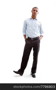 Young African business man standing relaxed and secure with hands in pocketand foot up, isolated