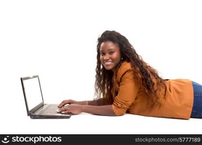 Young african student working with her laptop, isolated over a white background