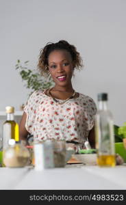 Young African Woman Cooking. Healthy Food - Vegetable Salad. Diet. Dieting Concept. Healthy Lifestyle. Cooking At Home. Prepare Food