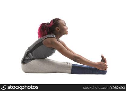 Young african woman doing a stretching exercise isolated on white background