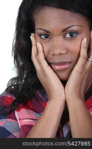 young Afro-American woman looking sad