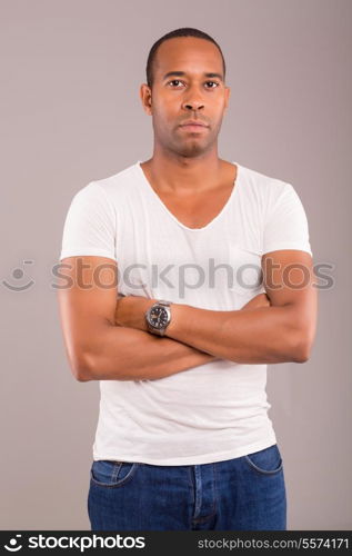 Young and beautiful african man posing isolated