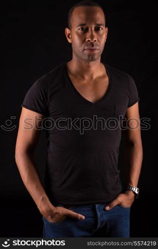Young and beautiful african man posing isolated