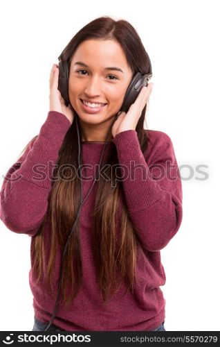 Young and beautiful asian woman listening to music