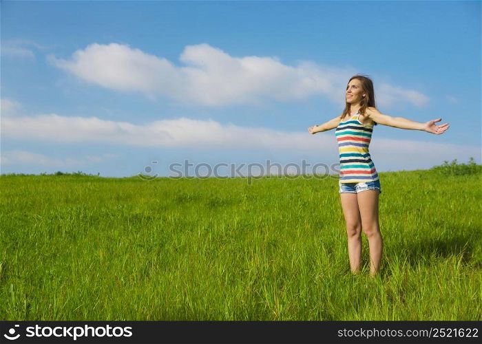 Young and beautiful woman feeling the nature