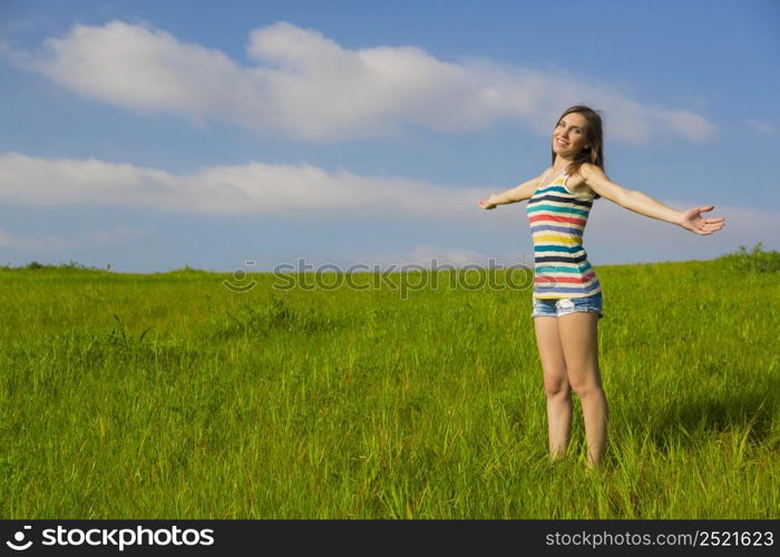 Young and beautiful woman feeling the nature