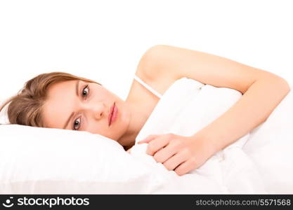 Young and beautiful woman in bed