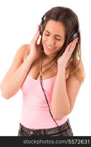 Young and beautiful woman listening to music