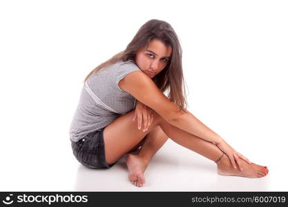 Young and beautiful woman posing - isolated