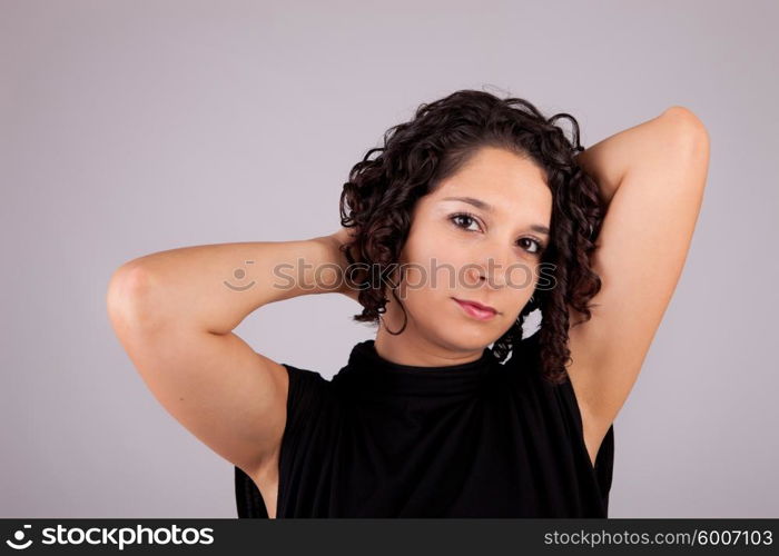 Young and beautiful woman posing - isolated