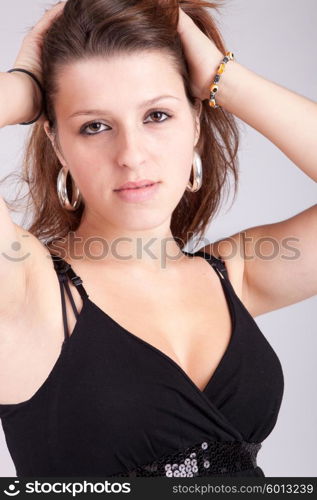 Young and beautiful woman posing - isolated