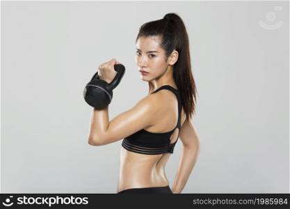 Young and beautiful woman working out