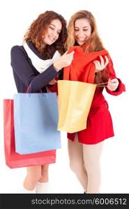 Young and beautiful women with shopping bags