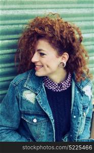 Young and cool redhead woman