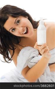 young and cute brunette with a white bottle where you can put your graphic showing it like an advertising
