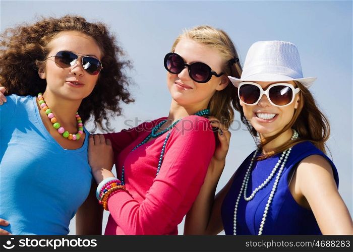 Young and happy. Attractive young women having fun outdoors. Summer vacation