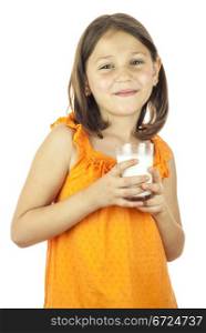 Young and healthy girl drinking a glass of milk