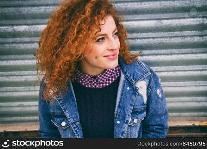 Young and redhead cool woman
