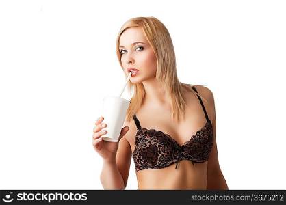young and sexy blond girl wearing brown bra and drinking from a paper cup isolated aver white, she takes the cup with right hand and looks in to the lens with sensual expression