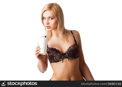young and sexy blond girl wearing brown bra and drinking from a paper cup isolated aver white, she takes the straw near the mouth and looks in to the lens