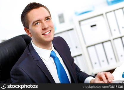 Young and successful businessman in the office