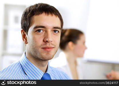 Young and successful businessman in the office