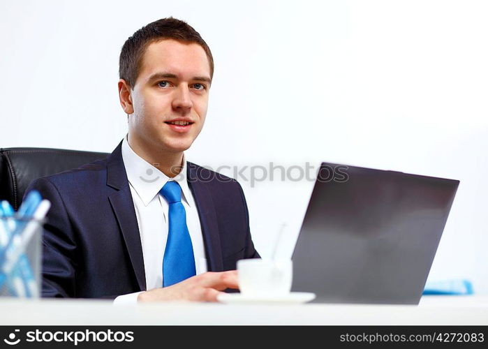 Young and successful businessman in the office