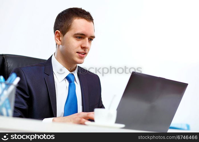 Young and successful businessman in the office