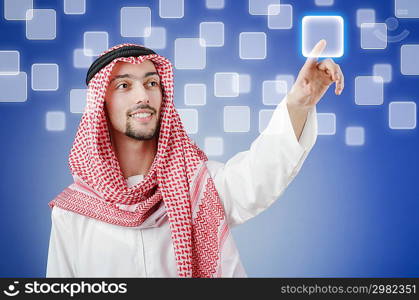 Young arab pressing virtual buttons