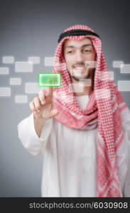 Young arab pressing virtual buttons