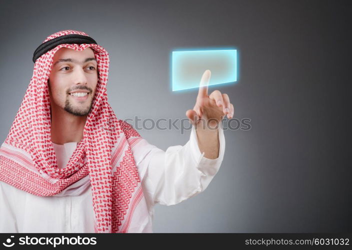 Young arab pressing virtual buttons