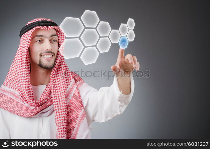 Young arab pressing virtual buttons