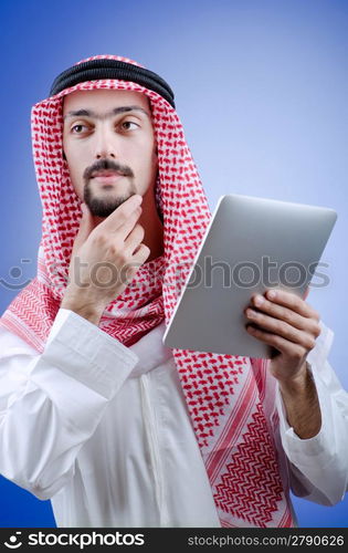 Young arab with tablet computer