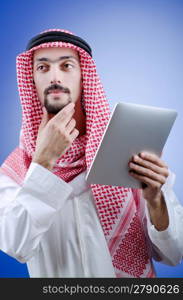 Young arab with tablet computer