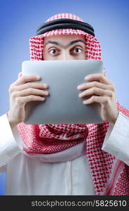 Young arab with tablet computer