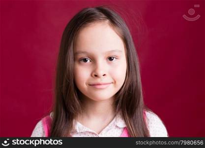 Young Asian American girl smiling and looking at camera
