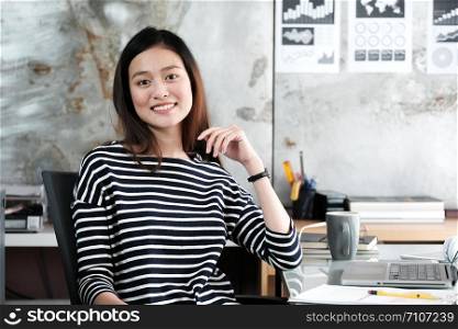 Young asian businesswoman working with happy emotion, working at home, office casual lifestyle concept