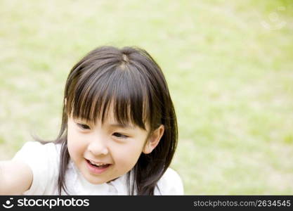 Young asian girl playing