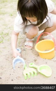 Young asian girl playing