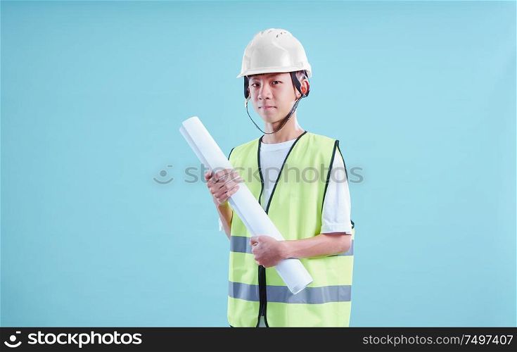 Young asian teenager wear Engineer suit posing in front of camera .Dreams and education concept .