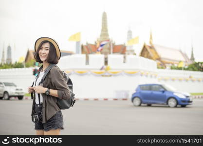 Young Asian travel girl is enjoying with beautiful place in Bangkok, Thailand