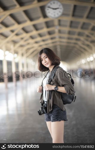 Young Asian travel woman is enjoying with beautiful place in Bangkok, Thailand